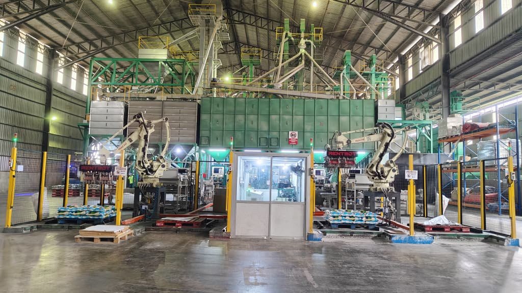 Robotic palletising and shrink-wrapping of finished rice sacks